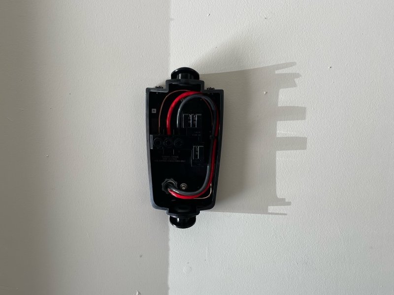 EV Charger hanging on wall