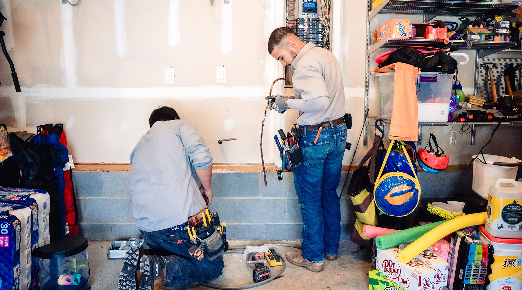 electricians-working-on-electric-panel