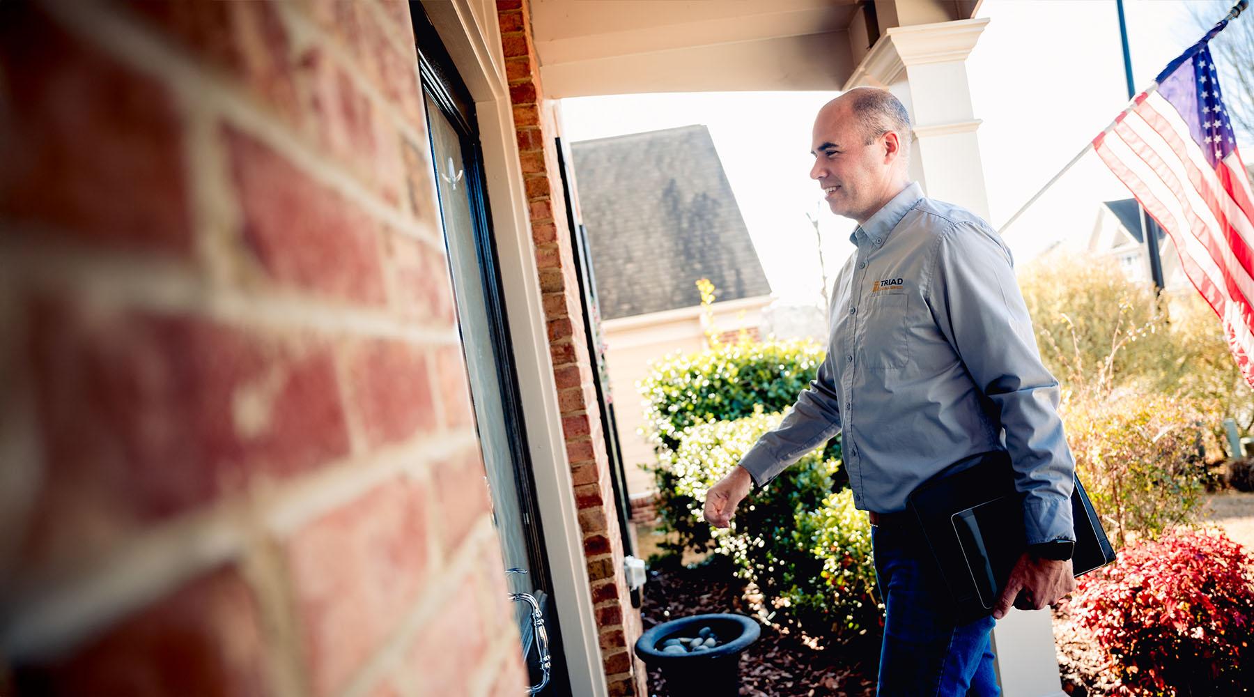 triad electrician outside customer door
